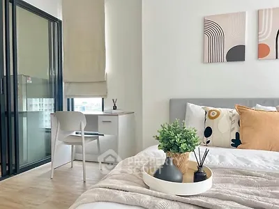 Modern bedroom with stylish decor and natural light