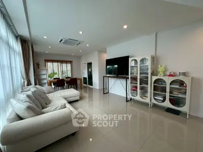 Spacious modern living room with elegant decor and natural light
