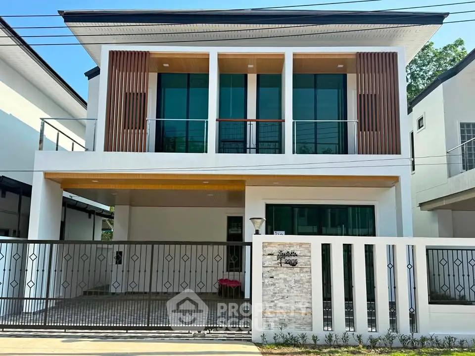 Modern two-story house with sleek design and spacious balcony