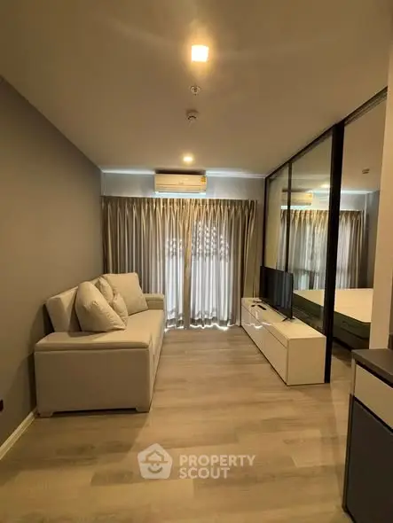 Modern living room with sleek design and natural light