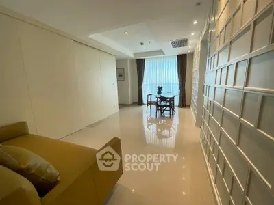 Spacious modern living room with elegant decor and ample natural light