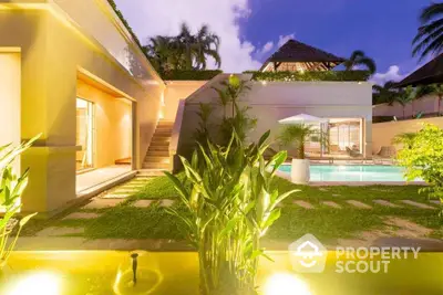 Luxurious villa with pool and lush garden at twilight, perfect for serene living.