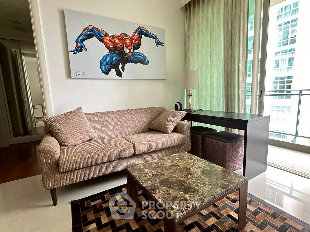 Stylish living room with modern decor and balcony view in urban apartment.