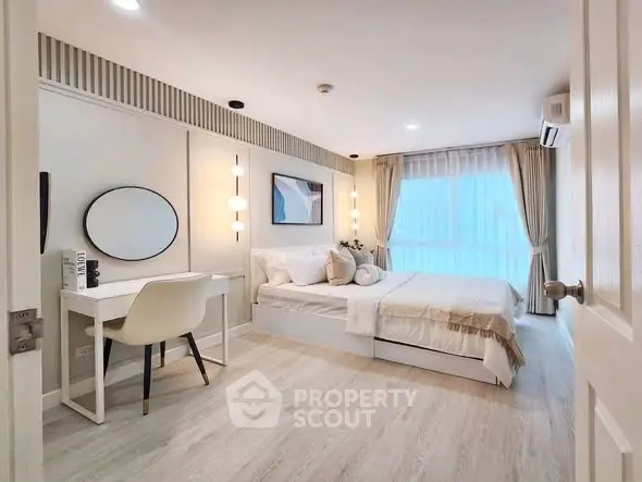 Modern bedroom with elegant decor and natural light