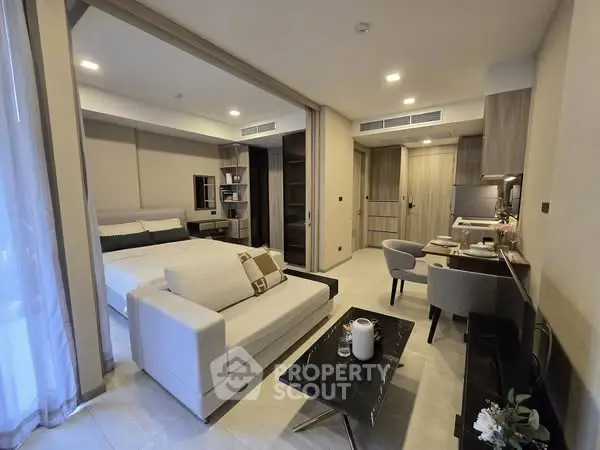 Modern studio apartment with open layout and stylish furnishings
