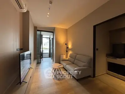 Modern living room with sleek design and natural lighting