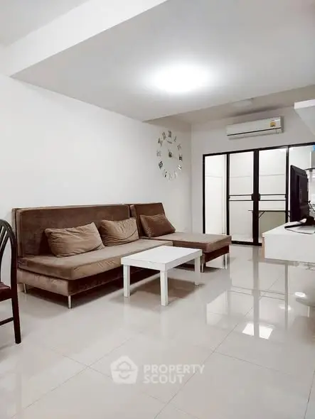 Modern living room with sleek furniture and minimalist decor