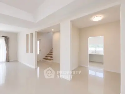 Spacious modern interior with polished floors and natural light