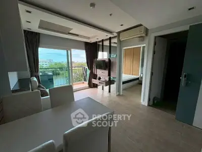 Modern living room with balcony view in stylish apartment
