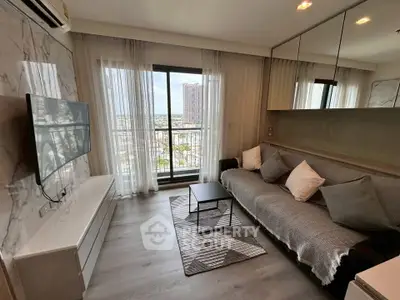 Modern living room with city view, sleek furniture, and large windows in a high-rise apartment.