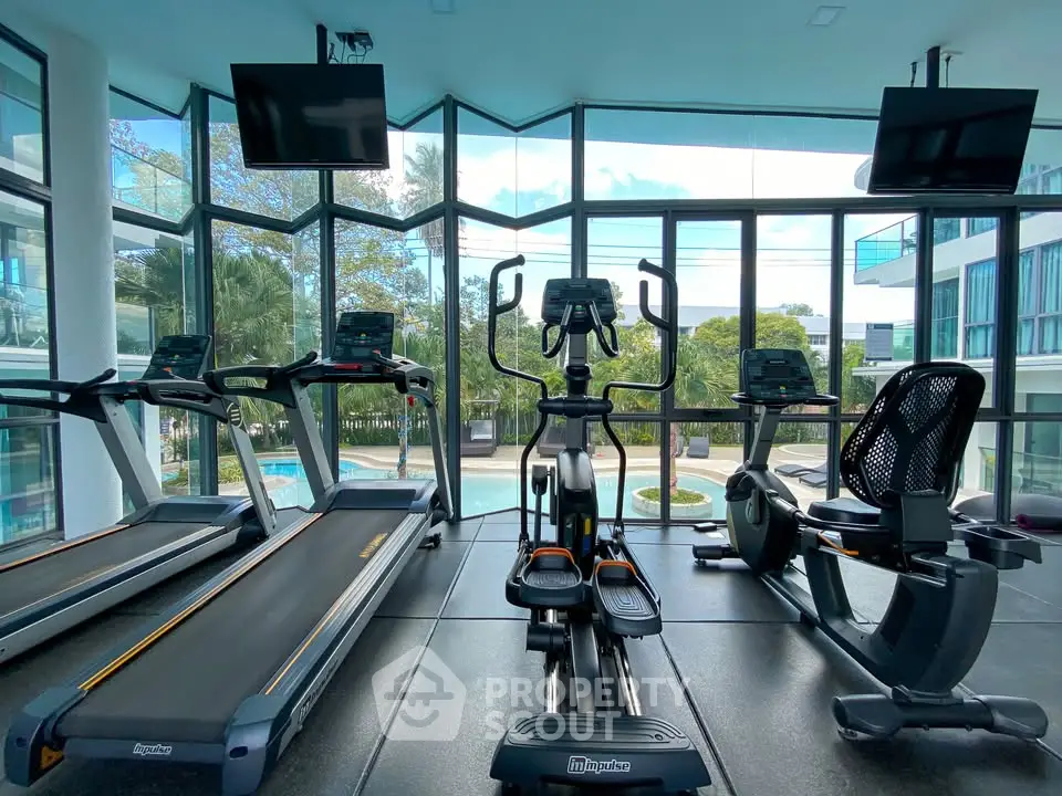 Modern gym with state-of-the-art equipment and scenic views
