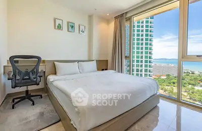 Modern bedroom with stunning ocean view and natural light