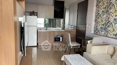 Cozy modern living room with open kitchen layout and stylish decor
