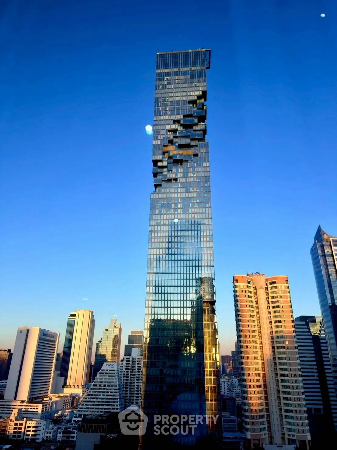 Stunning skyscraper with unique architectural design in vibrant cityscape