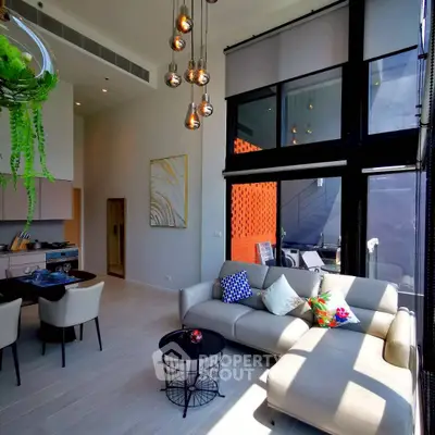 Luxurious modern living room with high ceilings and stylish decor