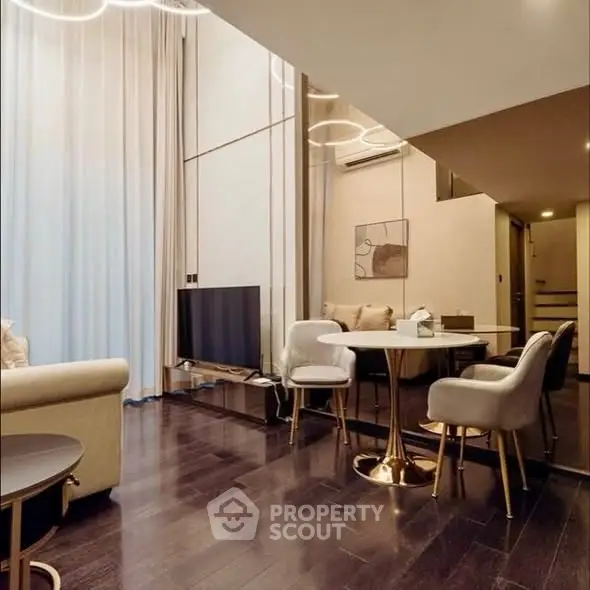 Elegant modern living room with high ceilings and stylish furniture