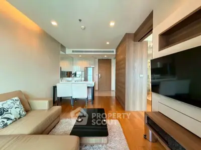 Modern living room with sleek furniture and open layout in luxury apartment