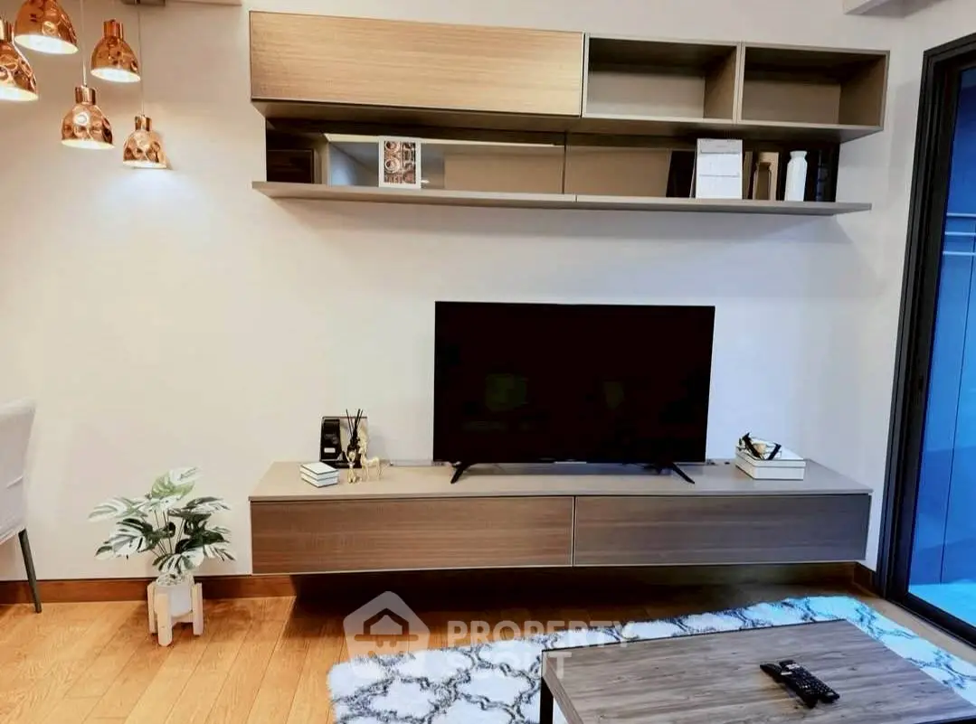 Modern living room with stylish TV unit and elegant decor