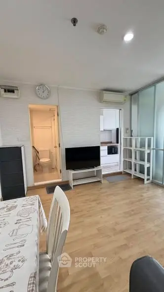 Modern apartment interior with open living space and kitchen