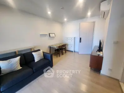 Modern living room with sleek furniture and minimalist decor