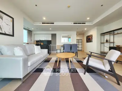 Spacious modern living room with stylish furniture and open layout