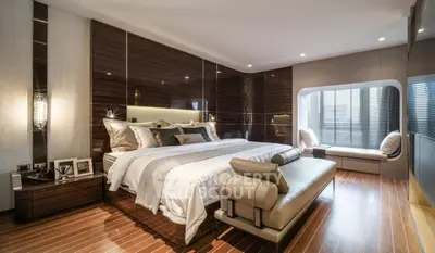 Luxurious modern bedroom with elegant wood paneling and stylish decor