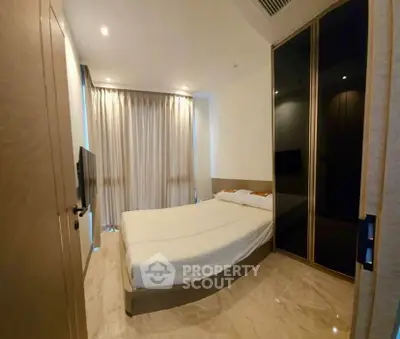 Modern bedroom with elegant design and large wardrobe