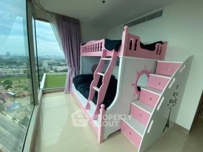 Charming bedroom with pink bunk bed and stunning city view from large window.