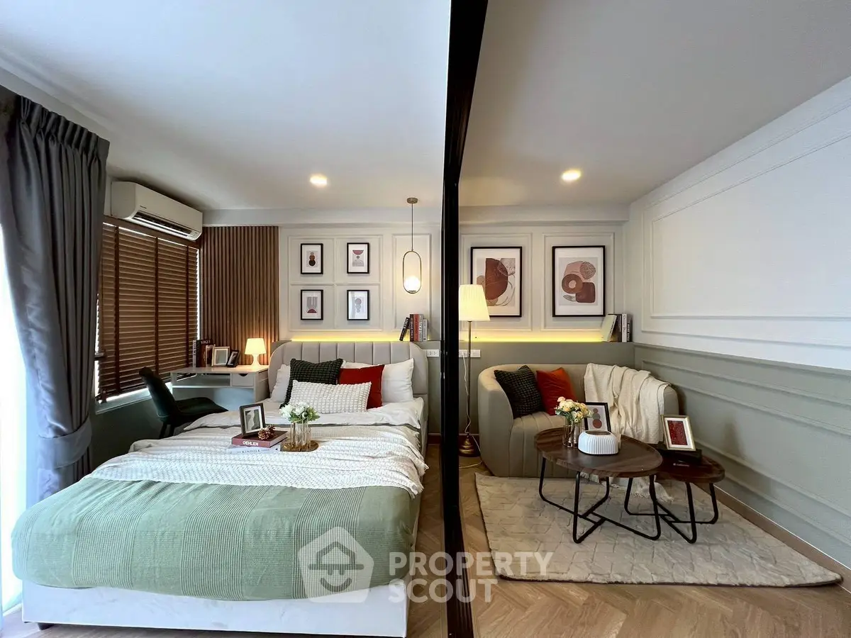 Stylish bedroom with cozy seating area and modern decor