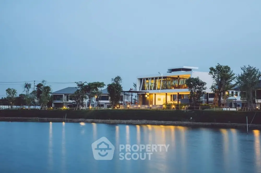 Luxurious waterfront modern home with stunning architectural design and serene surroundings