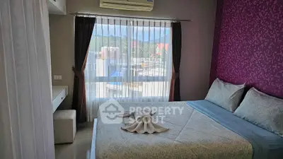 Cozy bedroom with scenic view and modern decor