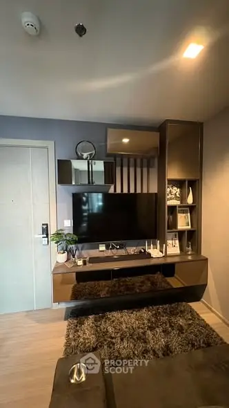 Modern living room with stylish TV unit and cozy decor