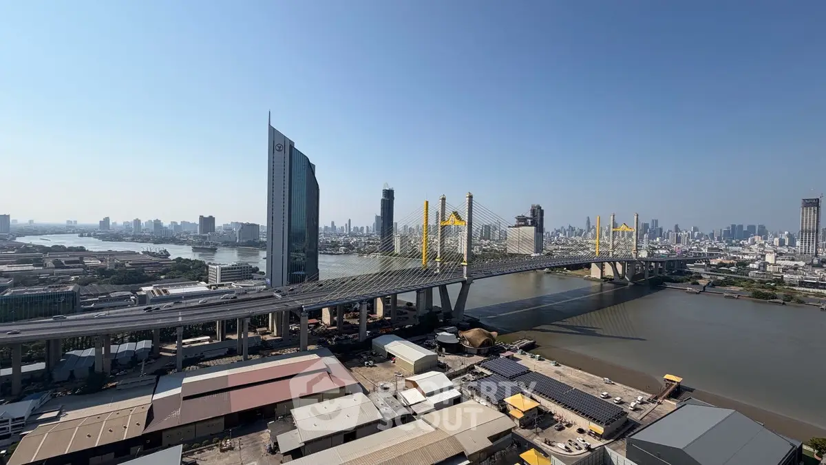 Stunning cityscape view featuring a modern bridge and skyline, perfect for urban real estate appeal.