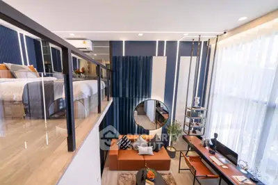 Modern loft apartment with stylish interior design and large windows