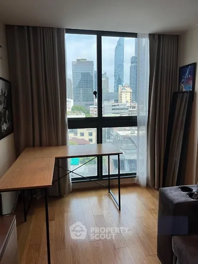 Modern apartment with stunning city view from large window, featuring sleek wooden flooring and minimalist decor.