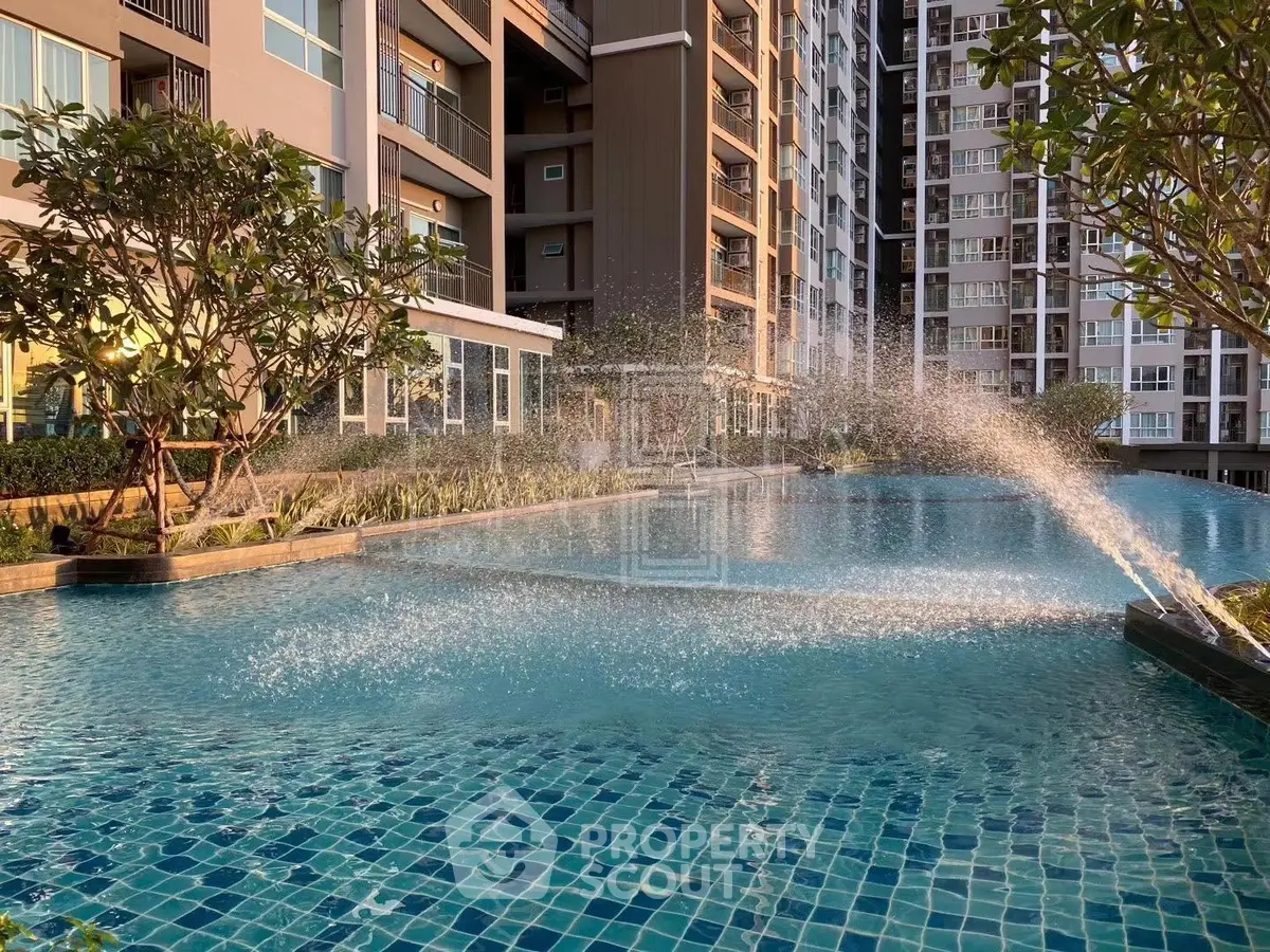 Luxurious condominium with stunning pool and modern architecture
