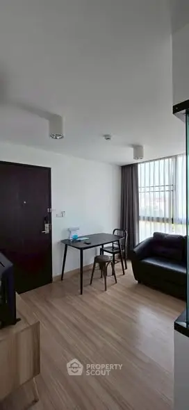 Modern living room with sleek furniture and natural light