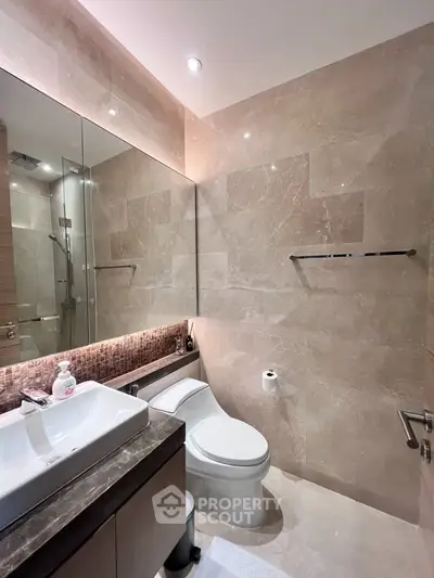 Luxurious modern bathroom with elegant marble tiles and sleek fixtures