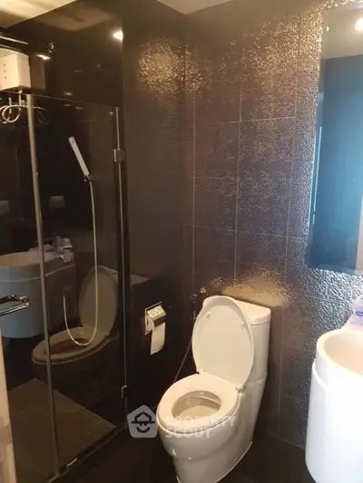Modern bathroom with sleek design and glass shower enclosure