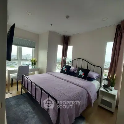 Modern bedroom with city view and stylish decor