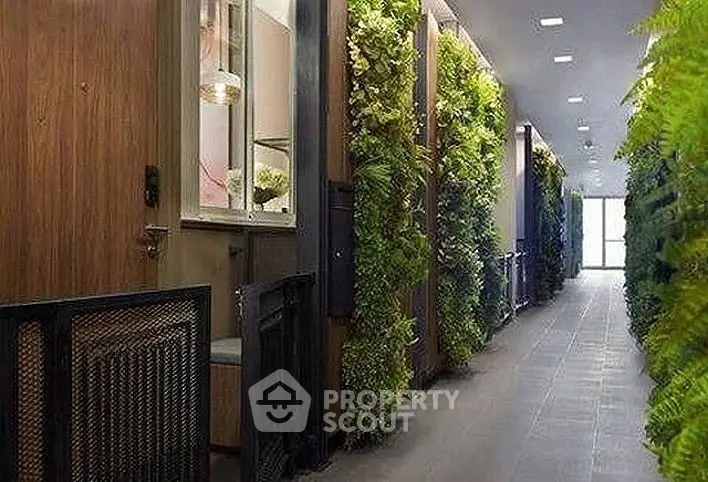 Modern hallway with vertical garden walls and sleek design