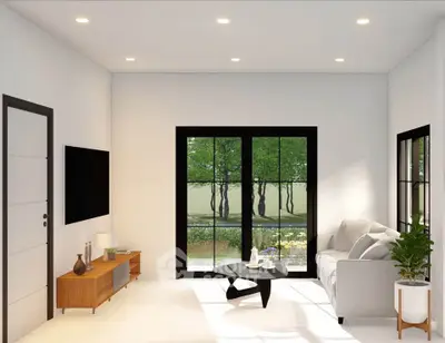 Modern living room with large windows and stylish furniture, offering a serene view of greenery outside.