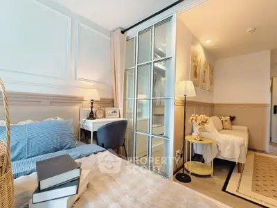Charming bedroom with elegant decor and cozy ambiance, featuring a stylish bed and soft lighting.
