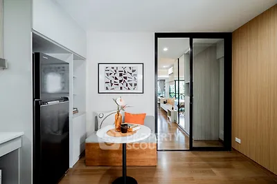 Modern living room with stylish decor and wooden flooring