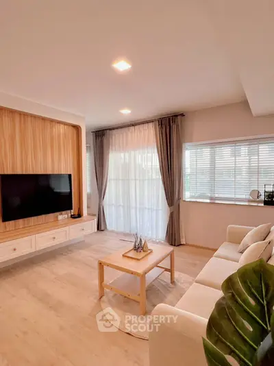 Modern living room with elegant decor and natural light