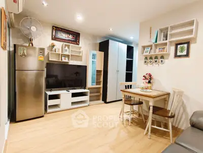Charming living room with modern decor and cozy dining area, perfect for relaxation and entertainment.