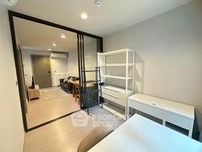 Modern living room with open layout and stylish furniture in a contemporary apartment.