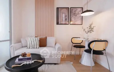 Chic modern living room with cozy sofa, stylish decor, and intimate dining area, perfect for urban living.
