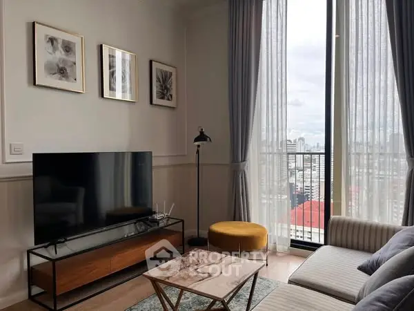 Modern living room with city view, stylish decor, and natural light.