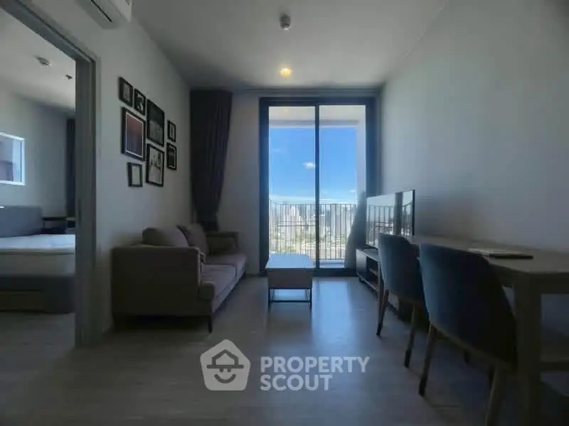 Modern living room with balcony view in a stylish apartment
